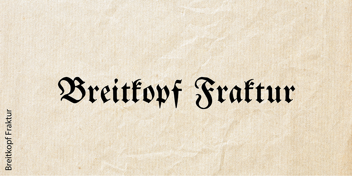 Die altdeutsche Schriftart "Breitkopf Fraktur" auf beigefarbenem Hintergrund
