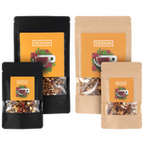 Tee i großen und kleinen Beuteln in schwarz und natur farben