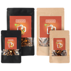 Tee in großen und kleinen Beuteln in schwarz und natur farben