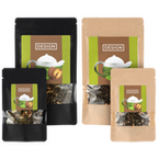 Tee in großen und kleinen Beuteln in schwarz ud natur farben