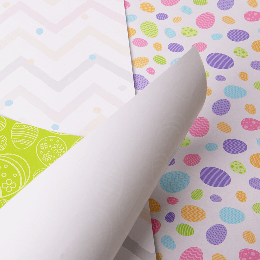 Detailansicht von 4/0-farbig bedrucktem Geschenkpapier mit verschiedenen Motiven