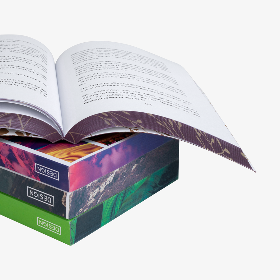 Veredelung des Buchblocks mit einem vollfarbig gedruckten Farbschnitt