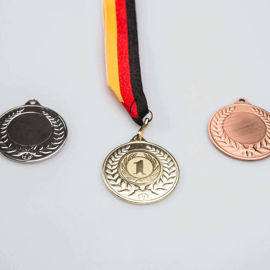  Medaille mit Lorbeerkranz mit Gravur als 3er-Serie in Gold, Silbe und Bronze