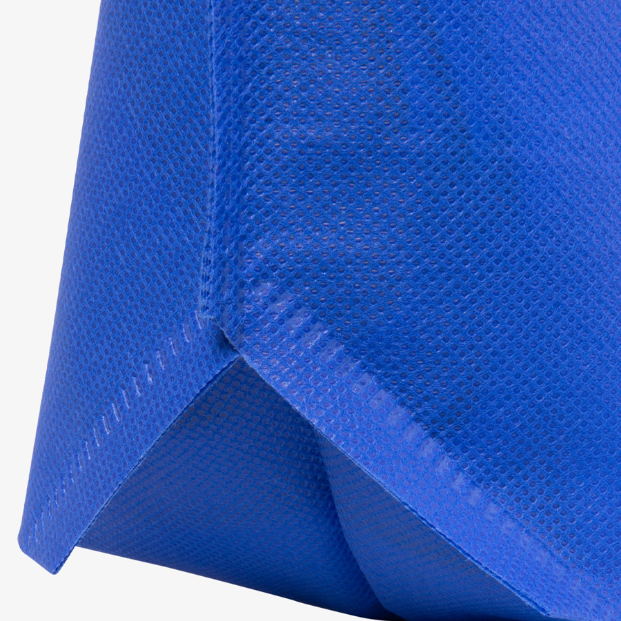 Detailansicht blaue Non-Woven-Tasche mit individuellem Druck und Bodenfalte