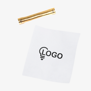 Sicherheitsos aus weißem Losdruckpapier mit individuellem Druckmotiv auf der Innenseite und glänzender Goldfolie auf der Außenseite in zusammengerollter Ansicht